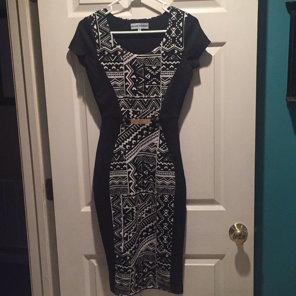 Almost Famous, Black and Tan knit stretch dress.